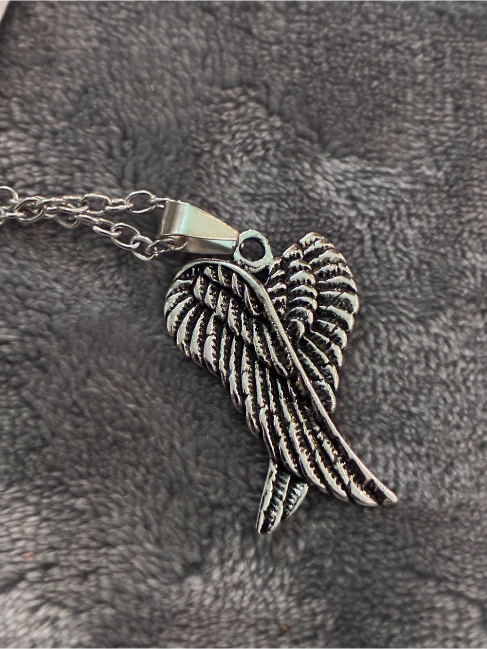 "Fallen Grace" – Blackened Silver Angel Wing Pendant
